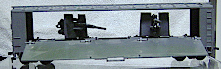 Army toy train: A.H.M. HO gauge Hidden cannon in box car $25.00